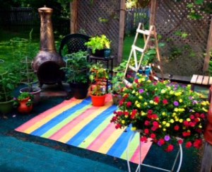 Eggplant and Cucumbers mingle with the flowers