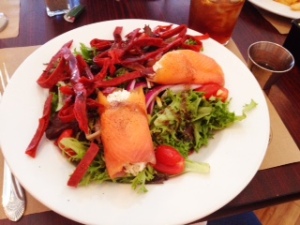 The dressing served with this salad compliments perfectly. That's crab rolled in the smoked salmon!
